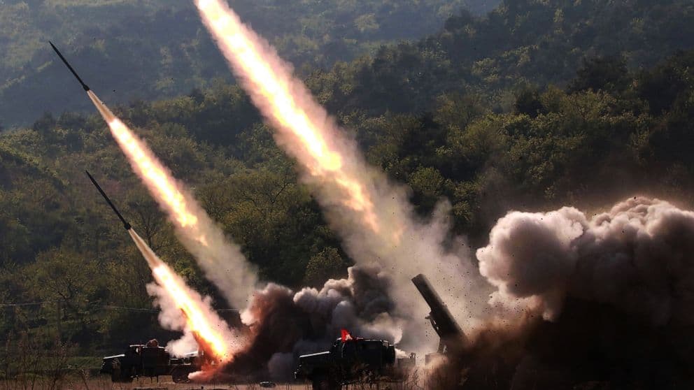 N Korea fires mid-range missiles kitabının kapağı